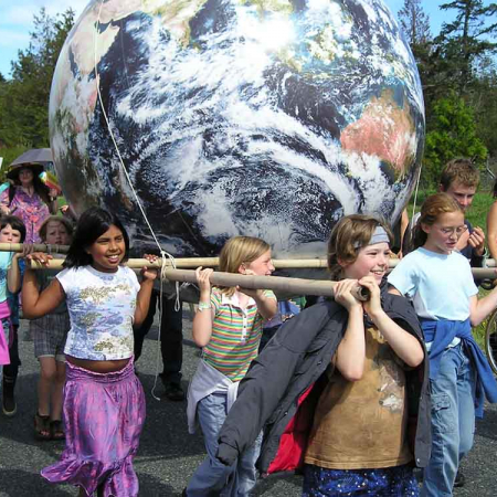 Giant Inflatable EarthBall, 6 feet in diameter, being carried by children in a Peace Day Parade 6' diameter giant EarthBall being carried by children in a peace Day Parade