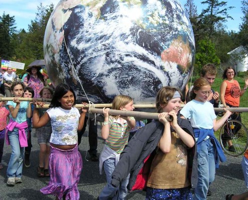 Giant Inflatable EarthBall, 6 feet in diameter, being carried by children in a Peace Day Parade 6' diameter giant EarthBall being carried by children in a peace Day Parade